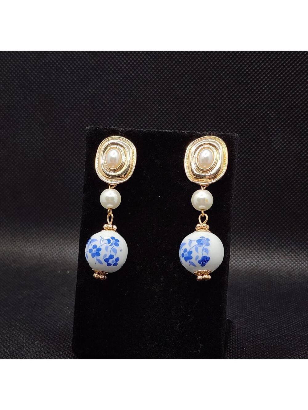 Gold tone porcelain bead drop earrings